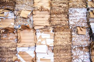 Compacted commercial cardboard waste